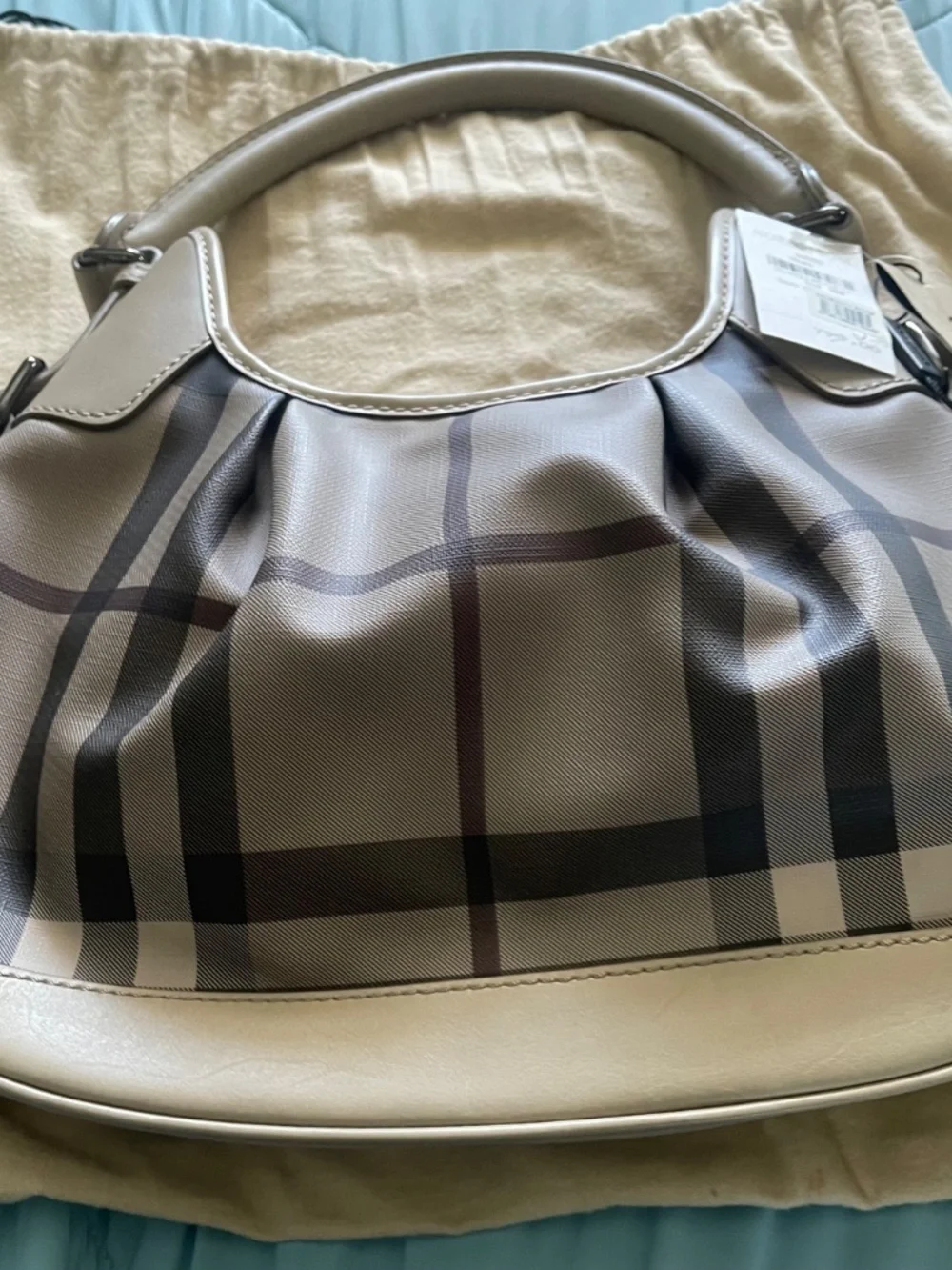 Burberry smoke trench hobo bag like nen